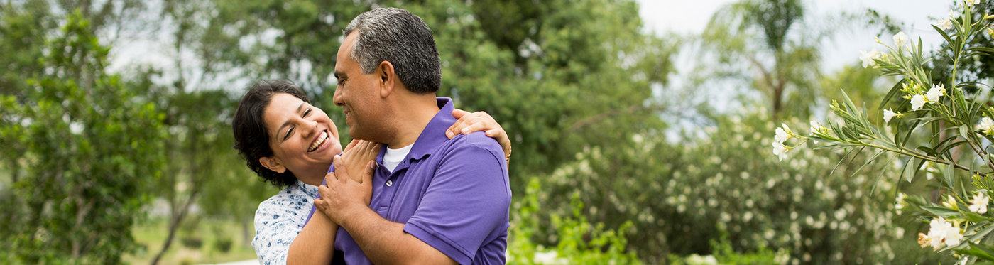 Senior couple hugging